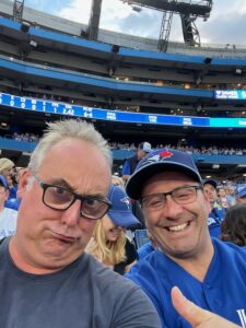 Stephane and Laurence enjoying a Jays game, Summer 2022